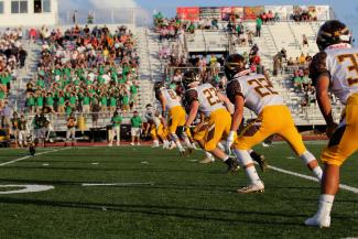 football game photo during daytime by Riley McCullough courtesy of Unsplash.